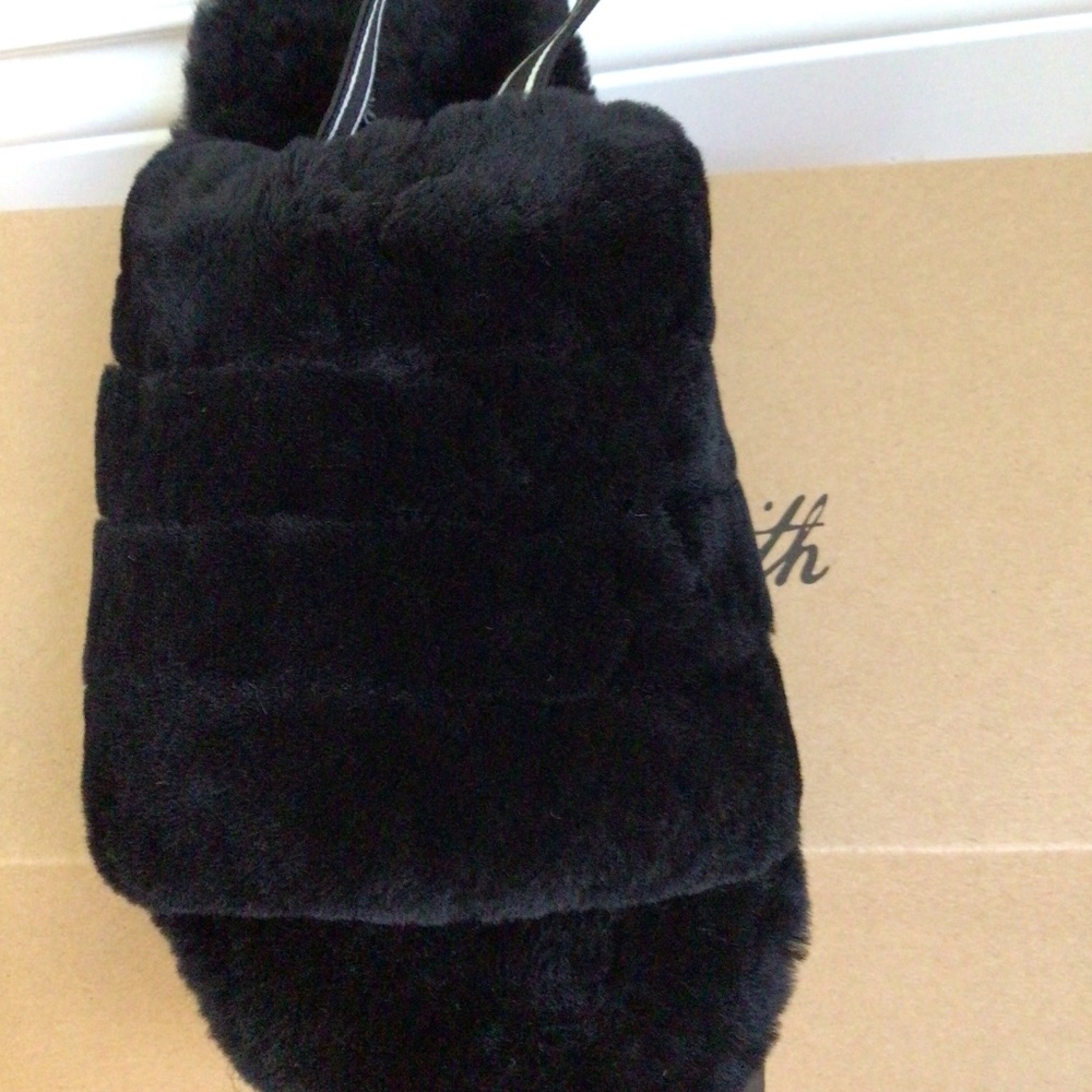 Brand new in box sheepskin slippers